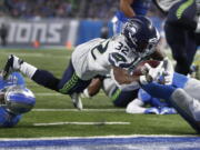 Seahawks running back Chris Carson (32) could miss Sunday’s game against the Rams with a hip injury.