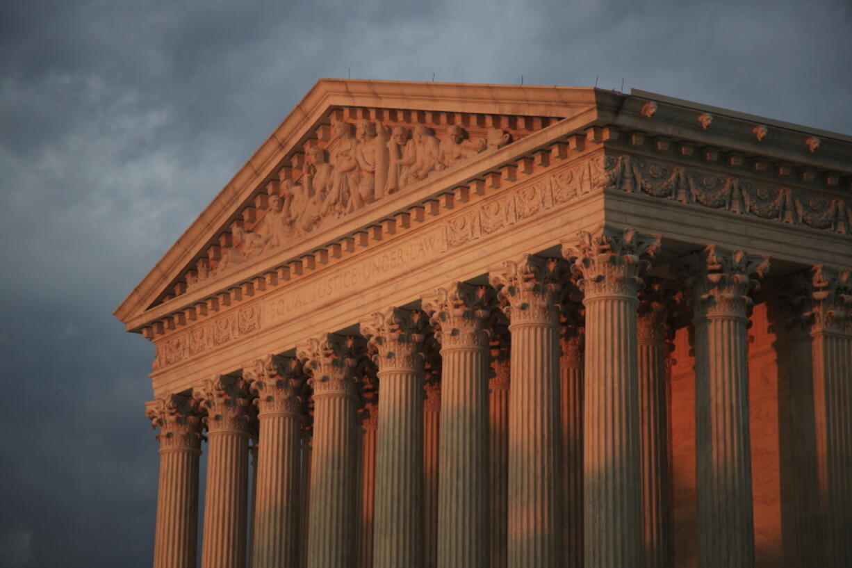 The U.S. Supreme Court is seen at sunset in Washington on Oct. 4. The court issued its first ruling of the session on Tuesday.