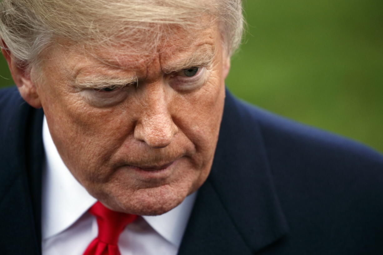 President Donald Trump speaks to members of the media before boarding Marine One on the South Lawn of the White House in Washington, Monday, Nov. 26, 2018, for a short trip to Andrews Air Force Base, Md., and then on to Mississippi for rallies.