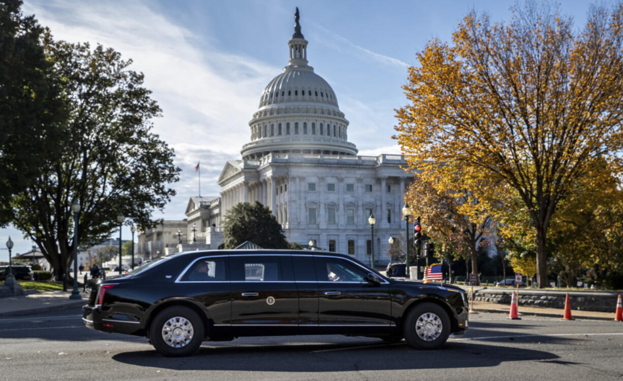 President Donald Trump’s motorcade leaves Capitol Hill after a ceremony for new Associate Justice Brett Kavanaugh at the Supreme Court, in Washington on Thursday. Suddenly facing life under divided government, President Donald Trump and congressional leaders talked bipartisanship but then bluntly previewed the fault lines to come. Trump threatened to go after House Democrats who try to investigate him, while Rep. Nancy Pelosi said her party would be “a check and balance” against the White House. (AP Photo/J.