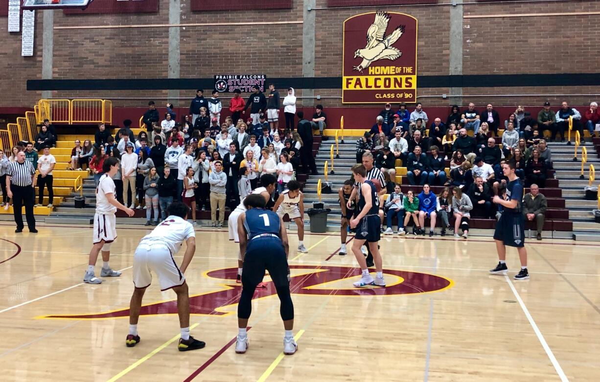 King's Way and Prairie boys basketball players ready for the opening tip of the 2018-19 season in a nonleague game at Prairie High School on Wednesday, Nov. 28, 2018.