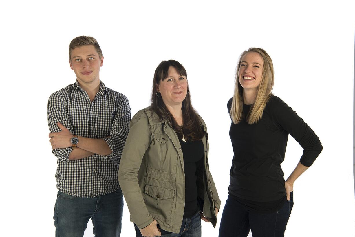 Columbian staff photographer Nathan Howard, left, photo editor Amanda Cowan and staff photographer Alisha Jucevic.