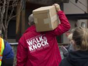 See the motto on this volunteer’s back? Walk & Knock organizers believe it’s true, but if anybody wants to compete for bragging rights, board member Tom Knappenberger said, bring it on.