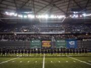 Union lines up before the Class 4A state football championship game against Lake Stevens on Saturday, Dec. 1, 2018, in Tacoma, Wash.