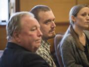 Todd Marjama Jr. listens to the jury's verdict with his attorneys in his murder trial Thursday afternoon, Dec. 6, 2018, in Clark County Superior Court. Marjama was found guilty of first-degree manslaughter and acquitted of first-degree assault.