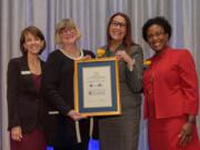 Portland: Amy Brown of Association of Fundraising Professionals, from left, Kim Hash with Share, Dianna Kretzchmar, an #Every28Days volunteer, and Kimberly Howard, who emceed the Association of Fundraising Professionals Awards, where #Every28Days earned the Outstanding Innovative Project award.