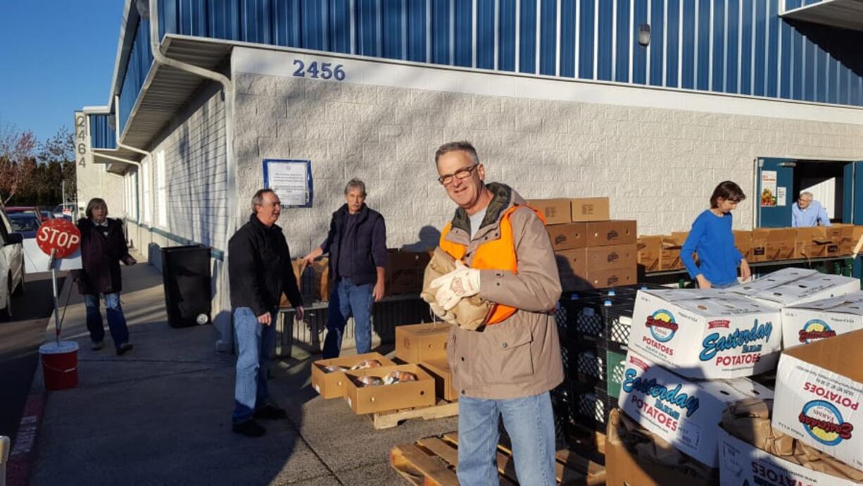 Barberton: Volunteers with the Vancouver St. Vincent de Paul Society Conference packed up and distributed 360 food boxes to local families on Thanksgiving.