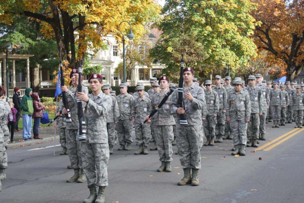 Orchards: John Snyder, Isaiah Hiebert, Dakota Sipe and Ryan Vittitoe of the Prairie High School Armed Drill Team perform at the Fort Vancouver Veterans Day parade.