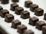 A fresh batch of salted caramels is pictured at Whimsy Chocolates. The Battle Ground-based company partnered with Jacobsen Salt Co. of Portland to offer different flavors of salted caramels.