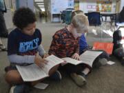 Washougal: Cape Horn-Skye Elementary School third-graders Reece Rogers, left, and Gideon Kestner receive dictionaries from the Camas-Washougal Rotary Club.