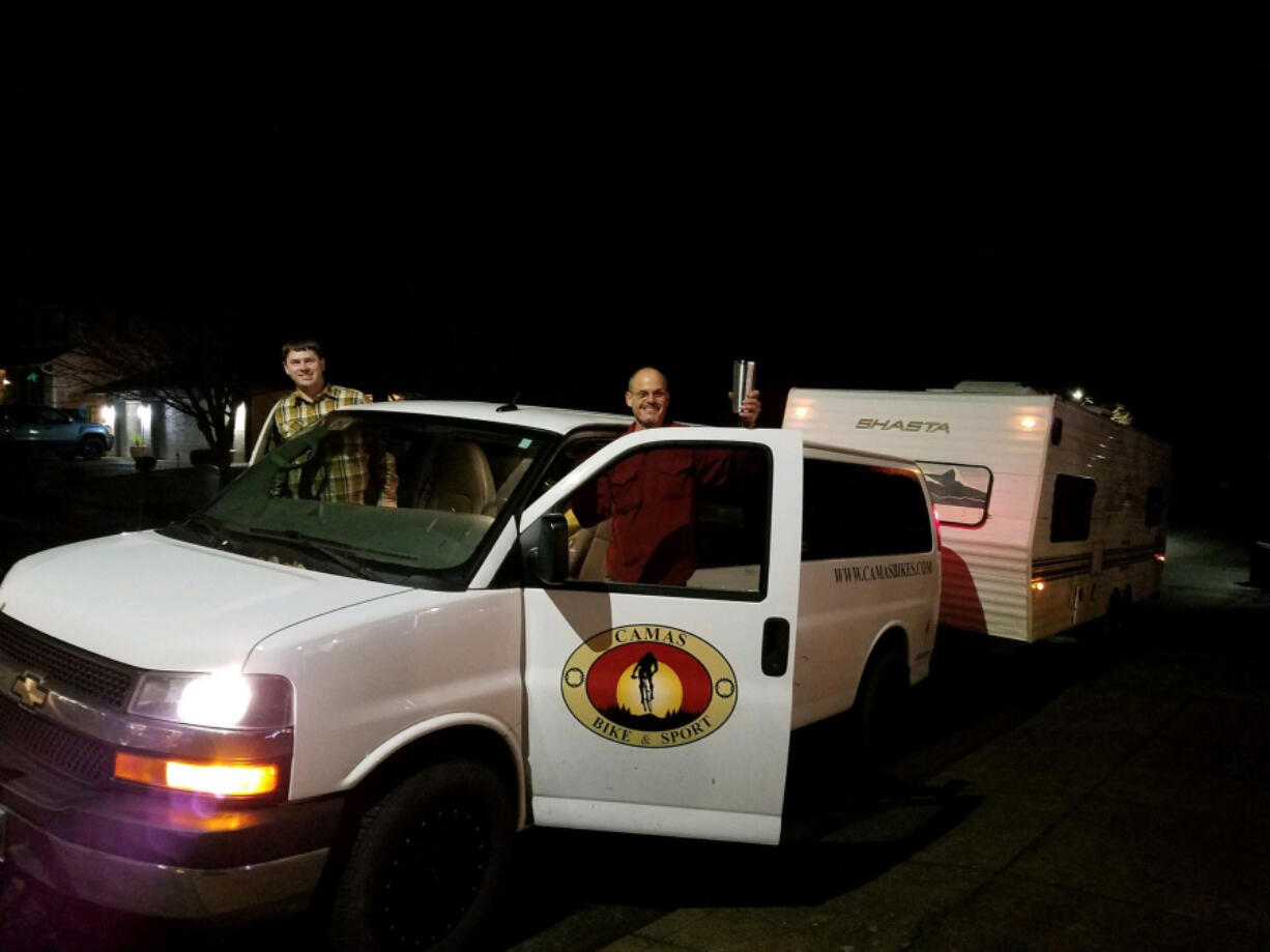 Jeff Paul, left, and Ed Fischer, owner of Camas Bike and Sport, drove a camper down to California last week to give it to a family displaced by the Camp Fire.