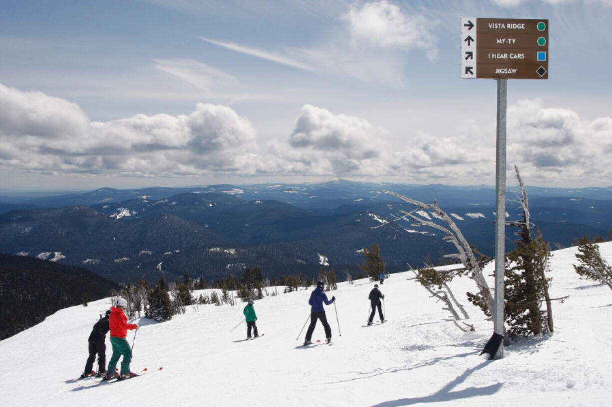 Skiers take in the views from the Mt. Hood Meadows Ski Resort last season near the top of the Vista Express high-speed chairlift. The Vista Experience, a specially groomed run, will allow beginners to get higher on the mountain and learn basic skills more quickly. Photos courtesy Mt.