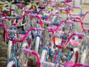 Bicycles are parked for final inspection during a bike building event at the Columbia Machine warehouse in December 2016. Waste Connection organized the event, with a goal of building 616 bikes for various organizations to distribute before Christmas.