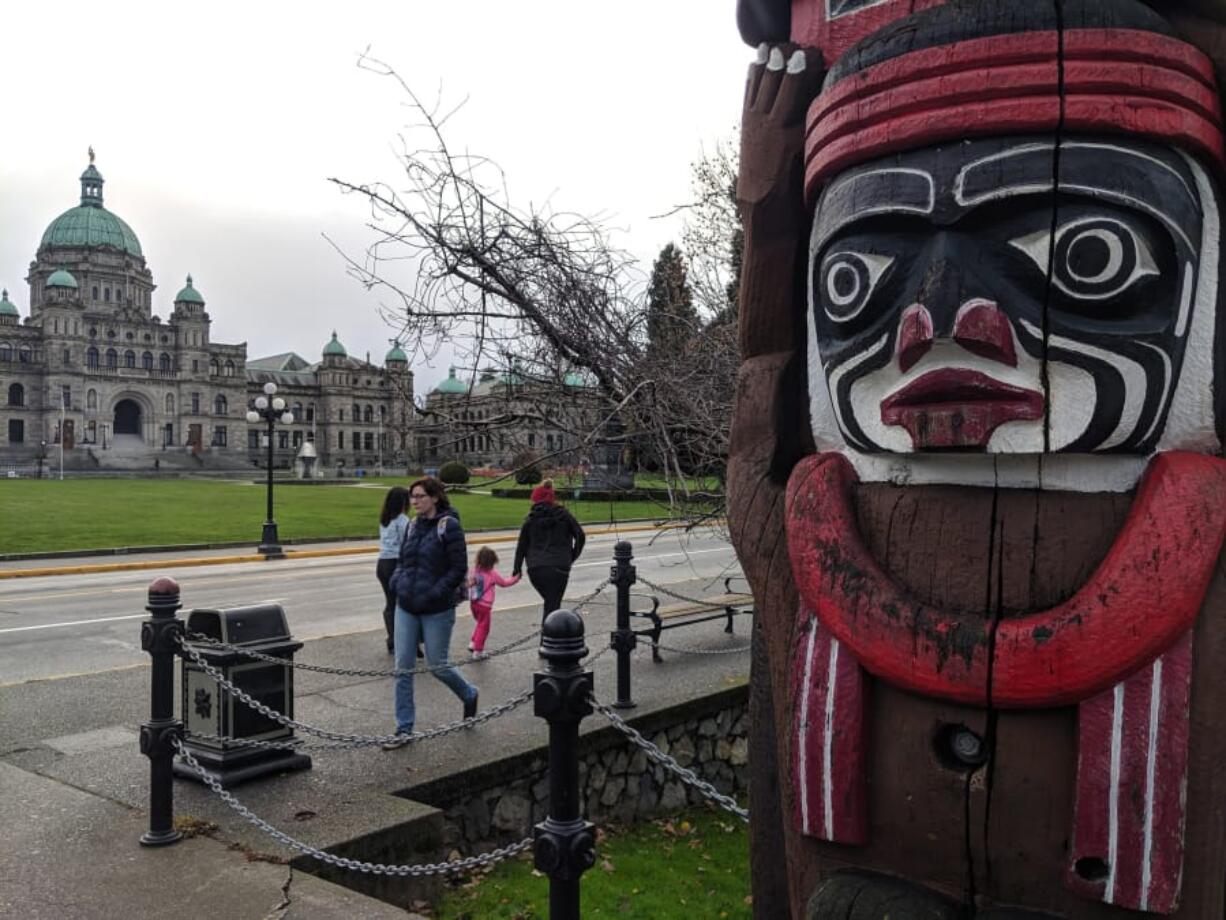 The Kwakiutl Bear Pole carved by Henry Hunt is one of several totem poles in prominent places around Victoria, British Columbia, Canada.