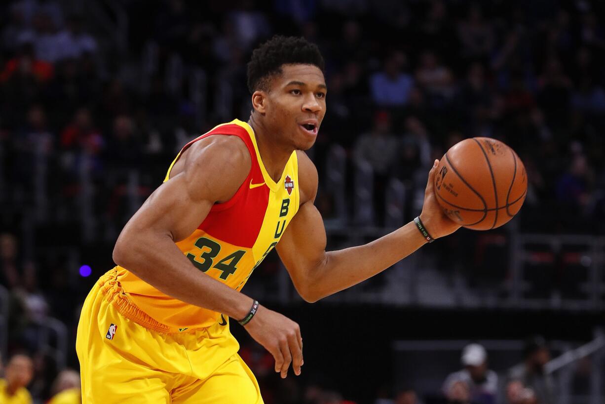 Milwaukee Bucks forward Giannis Antetokounmpo plays against the Detroit Pistons in the first half of an NBA basketball game in Detroit, Monday, Dec. 17, 2018.