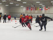 The Vancouver Junior Rangers U16 hockey team goes through a practice session at Mountain View Ice Arena in Vancouver. The hockey program, in addition to other offerings, continue to flourish after the arena announced it would remain open.