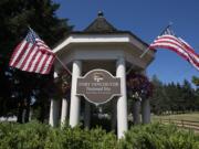 American flags fly high in July 2017 at the entrance to Fort Vancouver National Historic Site at the intersection of East Fifth Street and East Reserve Street.