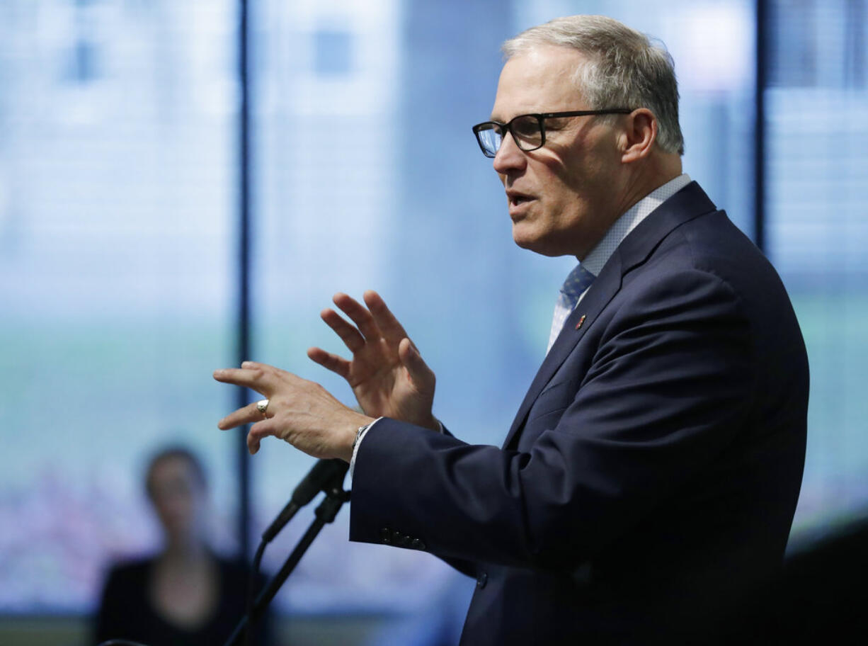 Washington Gov. Jay Inslee speaks Tuesday, Dec. 11, 2018, at Navos Mental Health and Wellness Center in Burien, Wash., about his budget and policy plans for fixing the state's struggling mental health system. Inslee is scheduled to unveil his full 2019-2021 budget on Thursday. (AP Photo/Ted S.