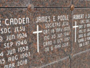 This Oct. 22, 2018 photo shows the marker for where the remains of Rev. James Poole are interned at Mount St. Michael in Spokane, Wash. Over the course of his life, Poole was accused of sexually abusing at least 20 women.