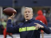 Seattle Seahawks head coach Pete Carroll passes during warmups before an NFL football game against the Kansas City Chiefs, Sunday, Dec. 23, 2018, in Seattle.