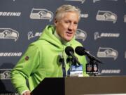 Seattle Seahawks head coach Pete Carroll talks to reporters following an NFL football game against the Kansas City Chiefs, Sunday, Dec. 23, 2018, in Seattle.