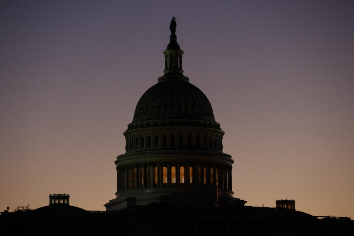 The U.S. Capitol Building Dome is seen before the sun rises in Washington, Tuesday, Dec. 18, 2018.