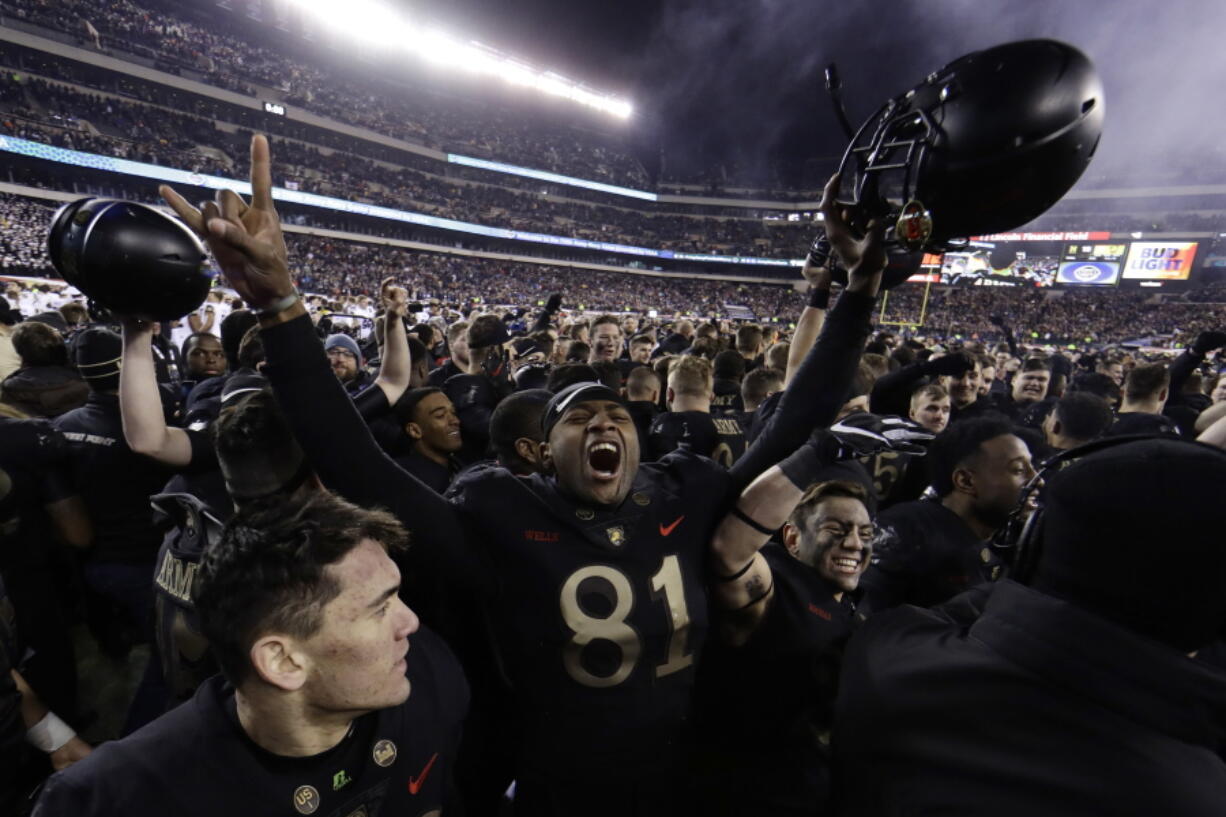 Army’s Ke’Shaun Wells celebrates after an NCAA college football game against Navy, Saturday, Dec. 8, 2018, in Philadelphia. Army won 17-10.