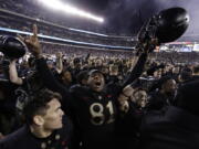 Army’s Ke’Shaun Wells celebrates after an NCAA college football game against Navy, Saturday, Dec. 8, 2018, in Philadelphia. Army won 17-10.