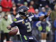 Seattle Seahawks quarterback Russell Wilson passes against the San Francisco 49ers during the second half of an NFL football game, in Seattle. Kansas City plays at Seattle on Sunday, Dec. 23.