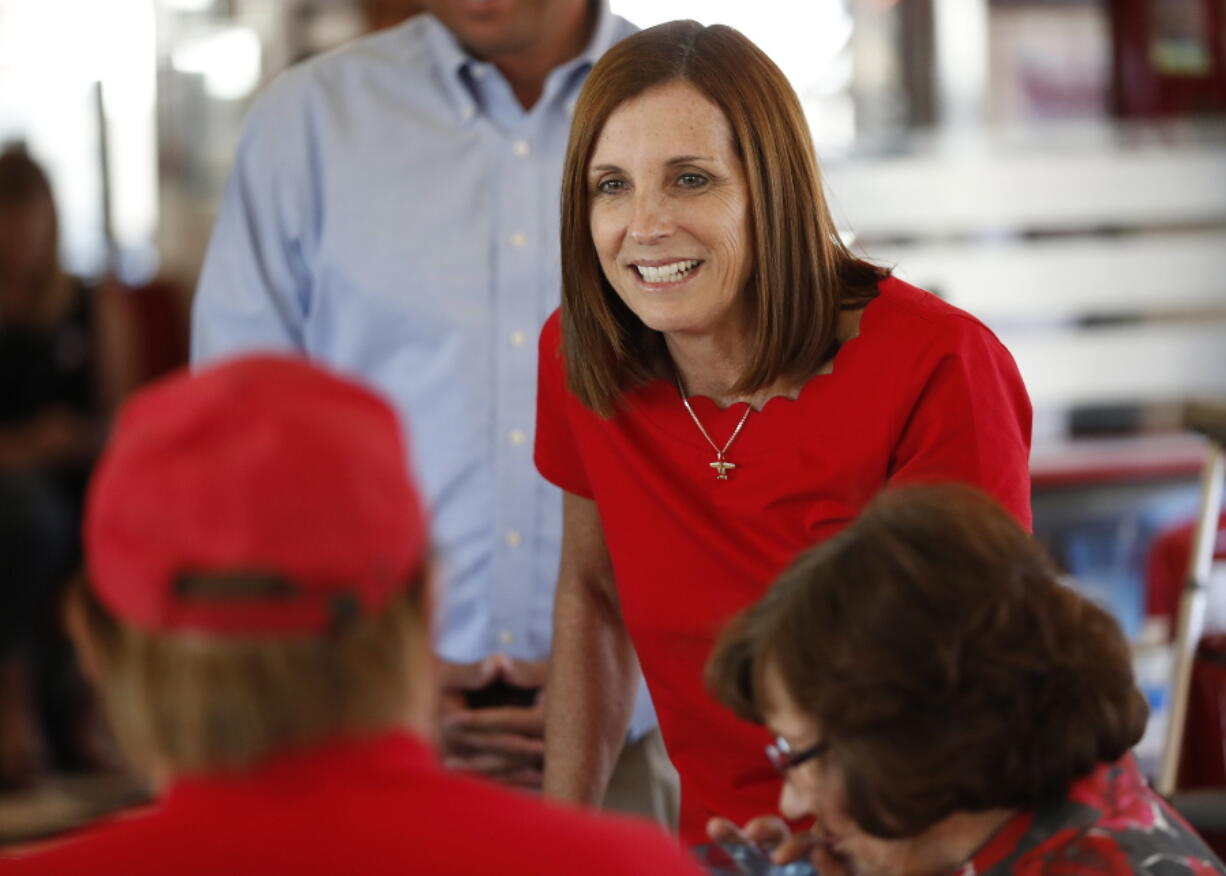 Arizona Republican senatorial candidate Martha McSally, speaks with voters, at Chase’s diner in Chandler, Ariz. Arizona’s governor has named McSally to replace U.S. Sen. Jon Kyl in the U.S. Senate seat that belonged to Sen. John McCain. Republican Gov. Doug Ducey announced Tuesday, Dec. 18, that McSally will take over after Kyl’s resignation becomes effective Dec. 31. McSally lost the Senate race to Democratic Rep. Kyrsten Sinema.