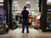 A 27-year-old self-described tech addict poses for a portrait Dec. 9 in front of a video game store at a mall in Everett. He asked to remain anonymous because he works in the tech industry and fears that speaking out about the negatives of excessive tech use could hurt his career.