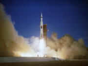 FILE - In this Dec. 21, 1968, file photo, the Apollo 8 crew lifts off from the Kennedy Space Center in Florida. Friday, Dec. 21, 2018 marks the 50th anniversary of the historic mission.