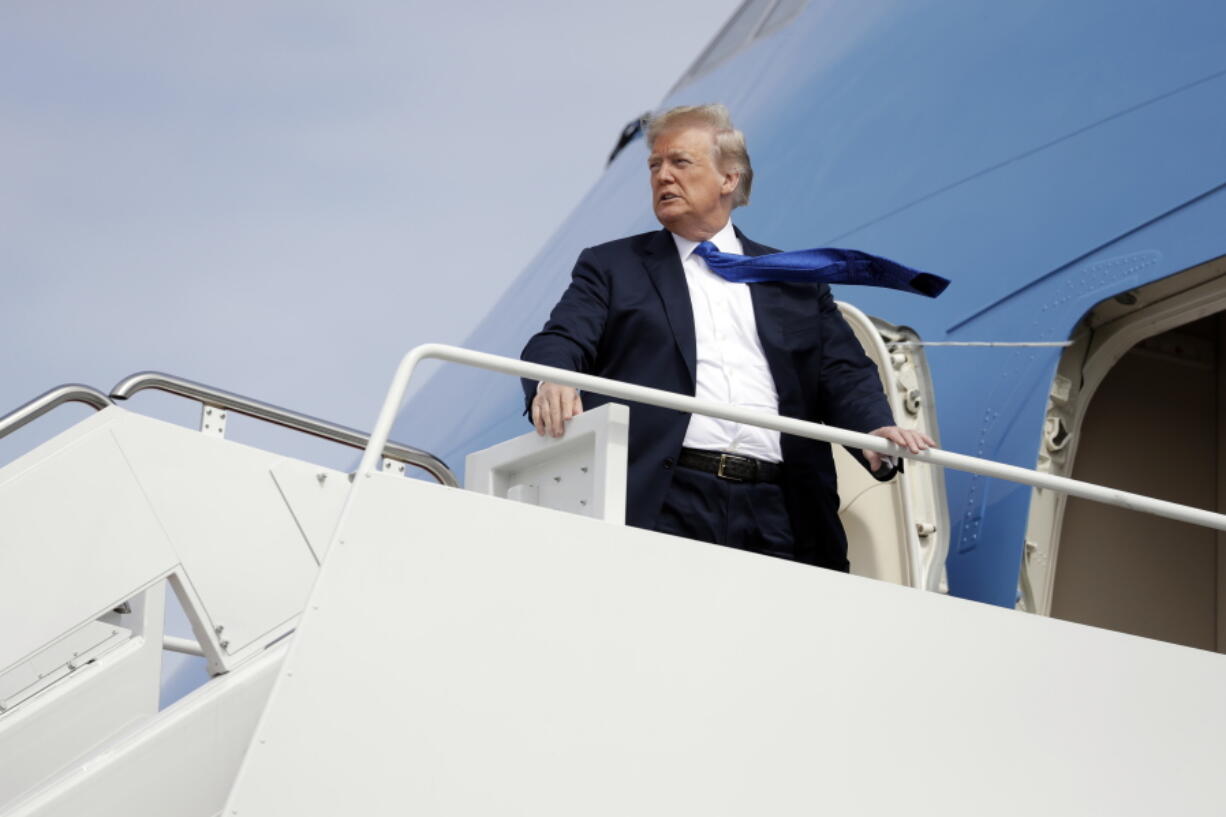 FILE - In this Oct. 2, 2018, file photo, President Donald Trump boards Air Force One at Andrews Air Force Base, Md. As the first two years of President Donald Trump’s administration close, Republican allies still haven’t figured out how best to influence a leader who takes cues from the forces that swept him to office and seems to fear losing them above all else.