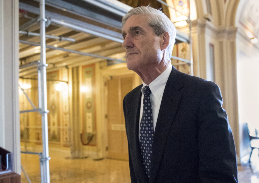 In this June 21, 2017, file photo, special counsel Robert Mueller departs after a meeting on Capitol Hill in Washington. Mueller is set to reveal more details about his Russia investigation as he faces court deadlines in the cases of two men who worked closely with President Donald Trump. (AP Photo/J.