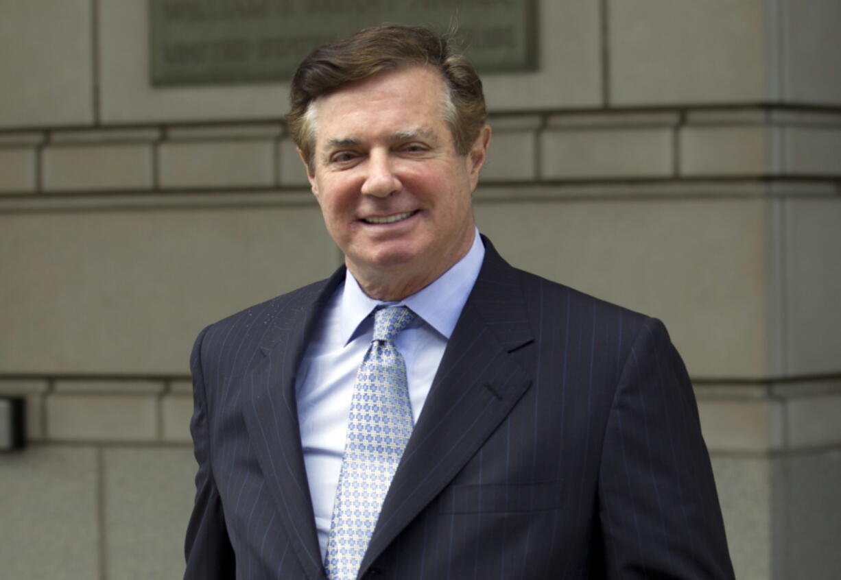 FILE - In this May 23, 2018, file photo, Paul Manafort, President Donald Trump’s former campaign chairman, leaves the Federal District Court after a hearing, in Washington. Spinning off from the special counsel’s Russia probe, prosecutors are ramping up their investigation into foreign lobbying by two major Washington firms that did work for former Trump campaign chairman Manafort, according to people familiar with the matter.