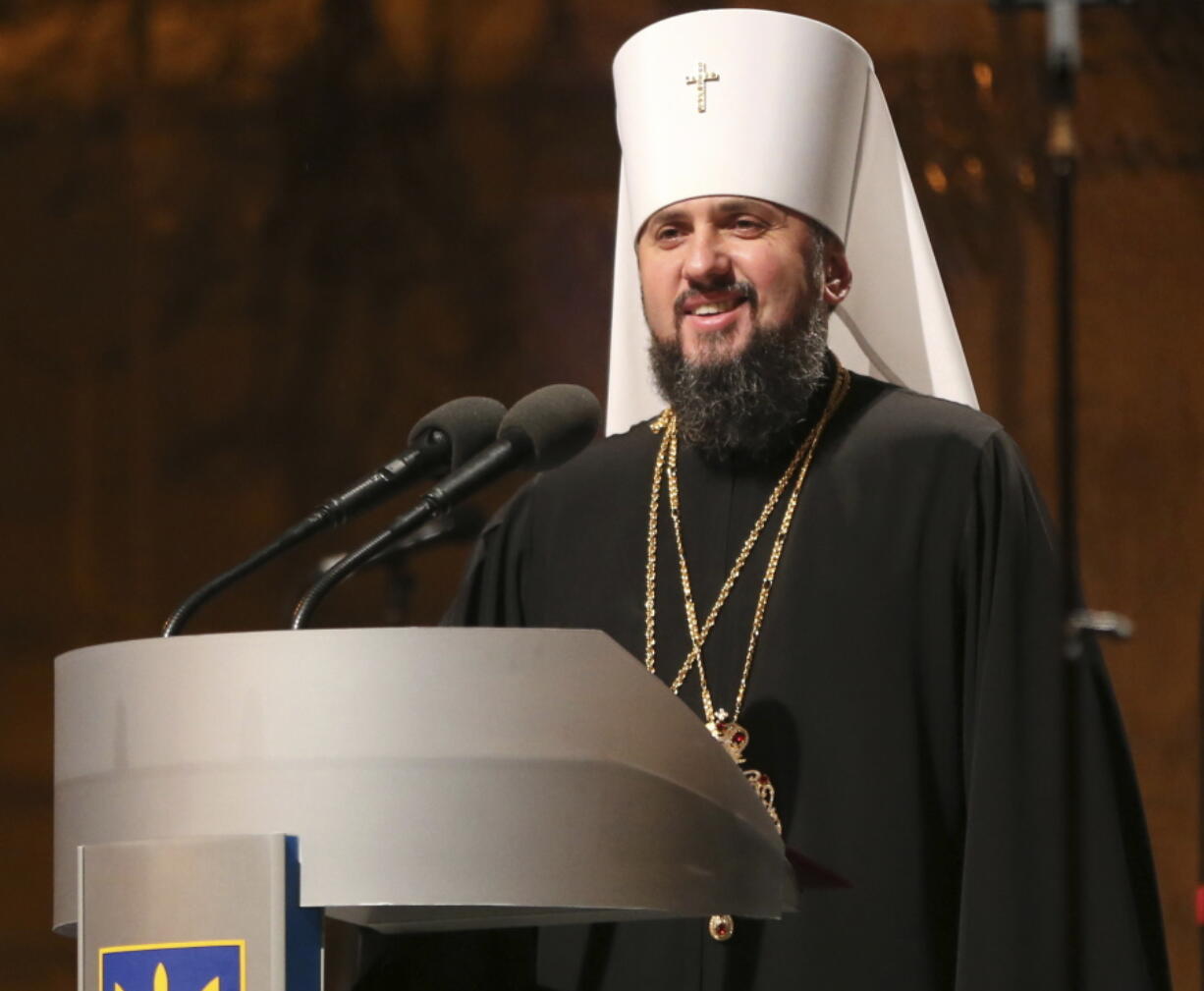 The leader of the new independent Ukrainian church, Metropolitan Epiphanius, 39, greets people Saturday near St. Sophia Cathedral in Kiev, Ukraine.