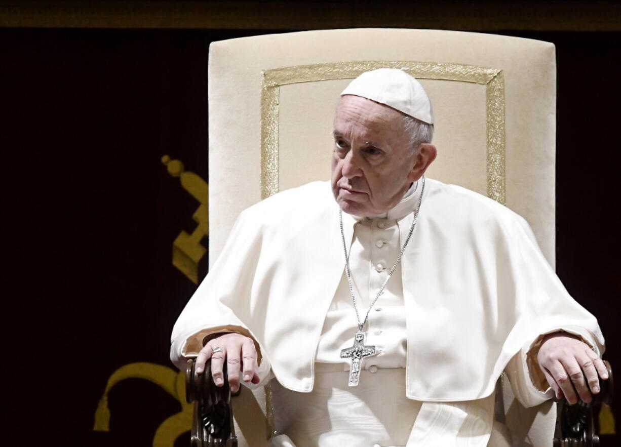 Pope Francis attends the traditional greetings to the Roman Curia on Friday at the Vatican.