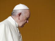 Pope Francis arrives Sept. 15 in Piazza Armerina, Sicily. Below: Pope Francis appears during his weekly general audience Aug. 22 in the Pope Paul VI hall at the Vatican. After commissioning an in-depth investigation into the Chilean church, Francis admitted he had made “grave errors in judgment” and personally apologized to the victims he had discredited.