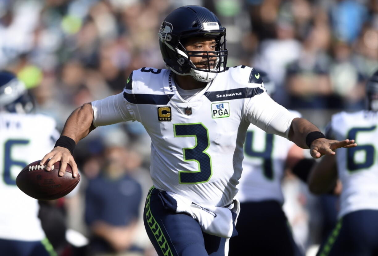 Through 12 games, Seattle Seahawks’ Russell Wilson has 29 touchdowns and just five interceptions. He has thrown at least two TD passes in eight straight games and 11 of 12 this season.