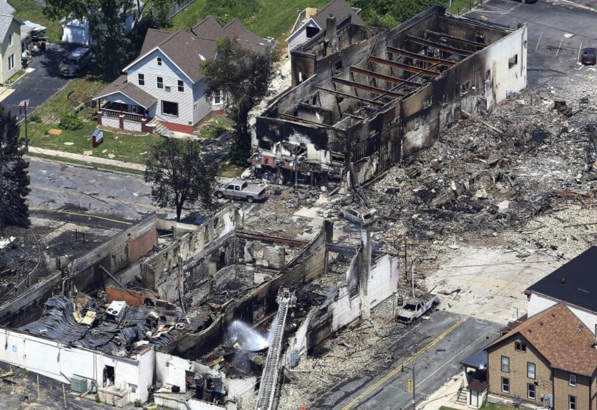 The aftermath of a gas explosion in downtown Sun Prairie, Wis. Police in Sun Prairie are planning to announce Thursday, Dec. 20, the results of a criminal investigation into an explosion that leveled a city block and killed a firefighter.