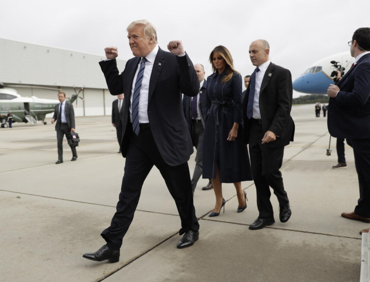 FILE - In this Sept. 11, 2018, file photo, President Donald Trump and first lady Melania Trump arrive at John Murtha Johnstown-Cambria County Airport in Johnstown, Pa. In his first two years in office, Trump has rewritten the rules of the presidency and the norms of the nation’s capital, casting aside codes of conduct and traditions that have held for generations.