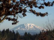 A fresh blanket of snow is visible on Mount St. Helens from the Washington State University Vancouver campus on Dec. 6, 2018. Seasonal temperatures in the upper 40s and lows in the upper 30s to low 40s are expected throughout the weekend.