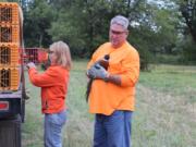 Julie Rouzee and Randy Dalton release pheasants at the Shillapoo Wildlife Area as volunteers with the Vancouver Wildlife League. The pheasant releases are one of many community-minded projects taken on by the league, which celebrates its 90th birthday this year.