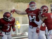 Eastern Washington quarterback Eric Barriere (3) celebrates a touchdown with Jayce Gilder (89) during the second half of an NCAA college football game against Maine, Saturday, Dec. 15, 2018, at Roos Field in Cheney, Wash.