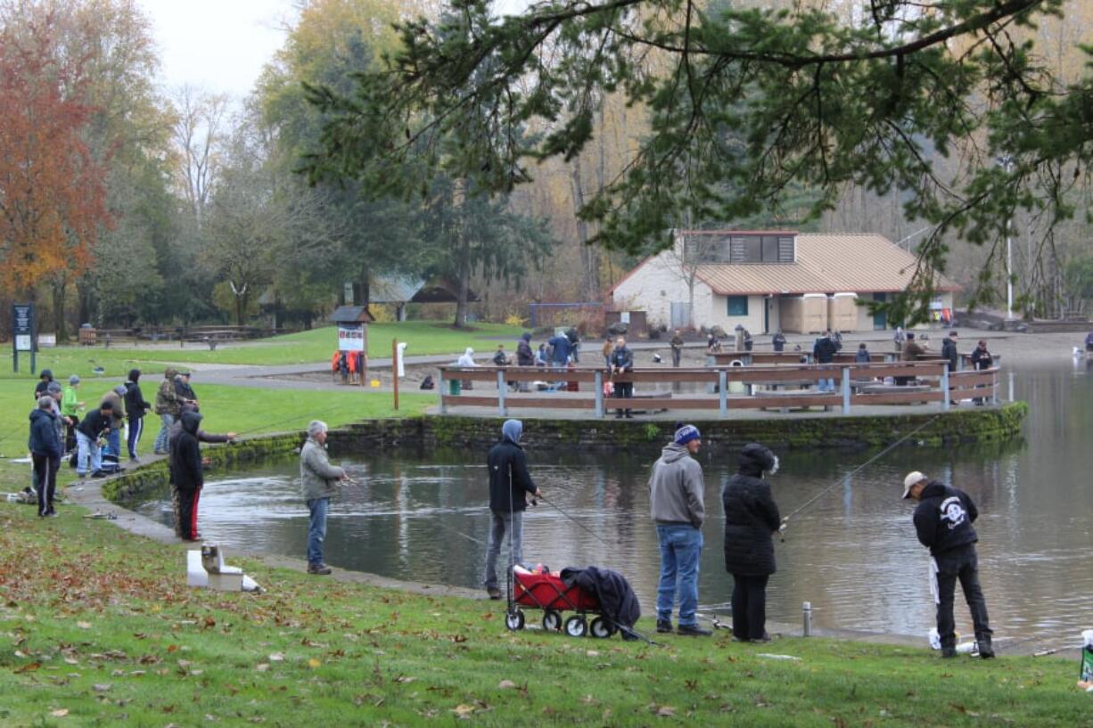 Anglers try their luck for rainbow trout recently at Klinline Pond north of Vancouver. Trout fishing is very good now all across Southwest Washington.