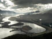 An aerial view of the Columbia River looking west with Bonneville Dam in the foreground. An multi-agency review of federal facilities impacting the Columbia River and its tributaries was set for completion in 2021 but has been put on an accelerated schedule by presidential order.