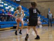 Mountain View’s Amalie Molvaer looks to pass during a JV basketball game against Prairie at Mountain View High.