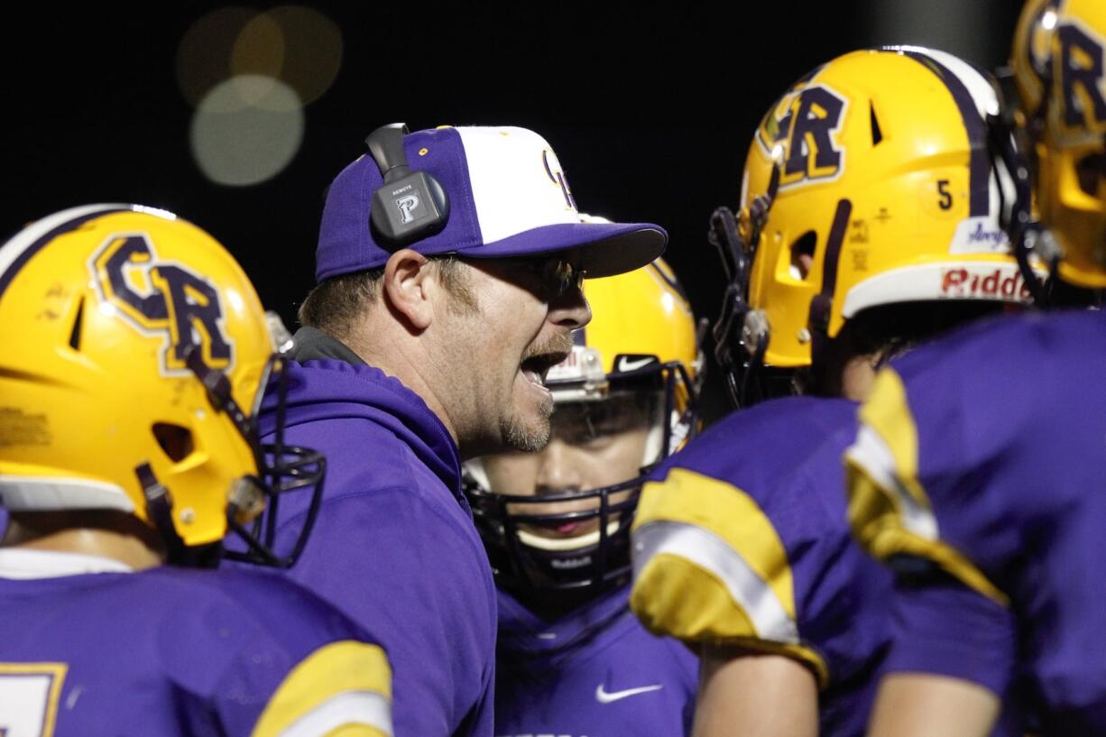 Ex-Columbia River head coach Christian Swain is Evergreen's new football coach.