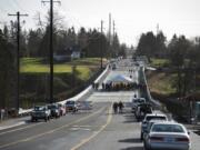 Local officials and community members gathered for the ribbon cutting of the new bridge over Whipple Creek on Dec. 18. It is now open to traffic.