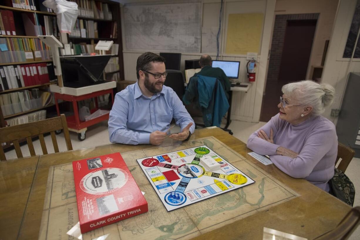 Brad Richardson, executive director of the Clark County Historical Museum, and Pat Jollota, a former director of the museum, play the local history game that Jollota helped create in the early 1990s. Local mayors will field some of the questions Jollota wrote (which are pretty hard, she confessed) next week during the inaugural “History on Tap” event at the Kiggins Theatre.